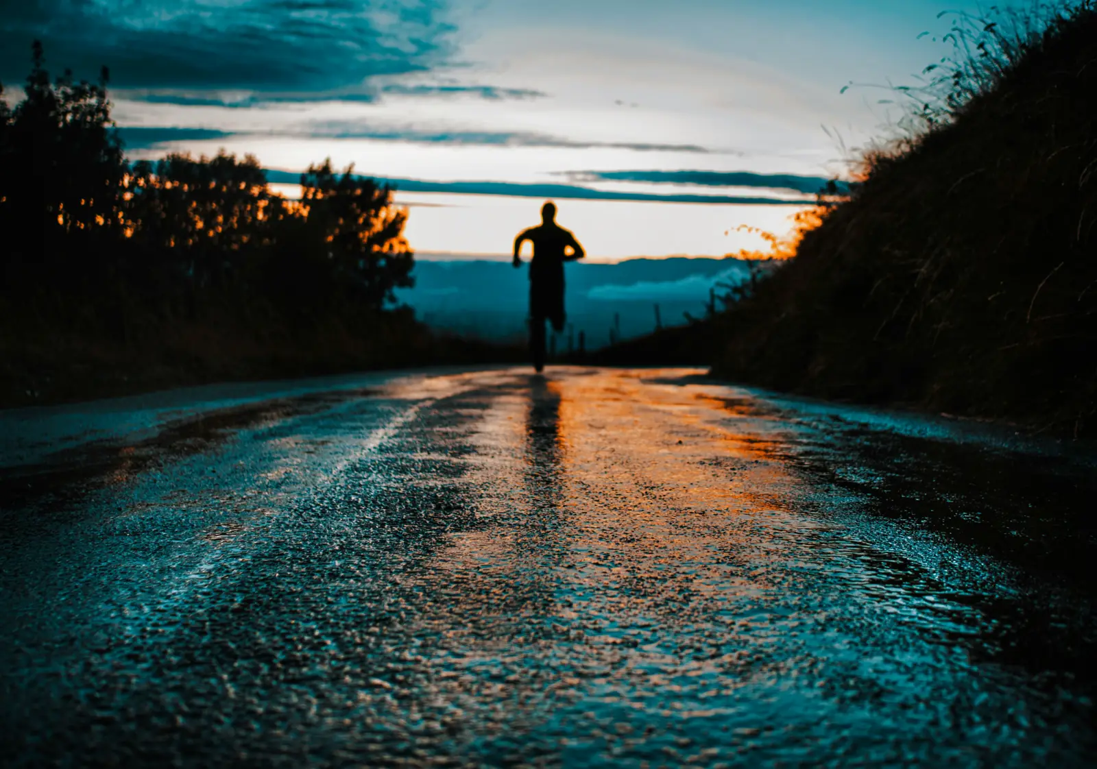 An endurance athlete training at dusk, guided by readiness