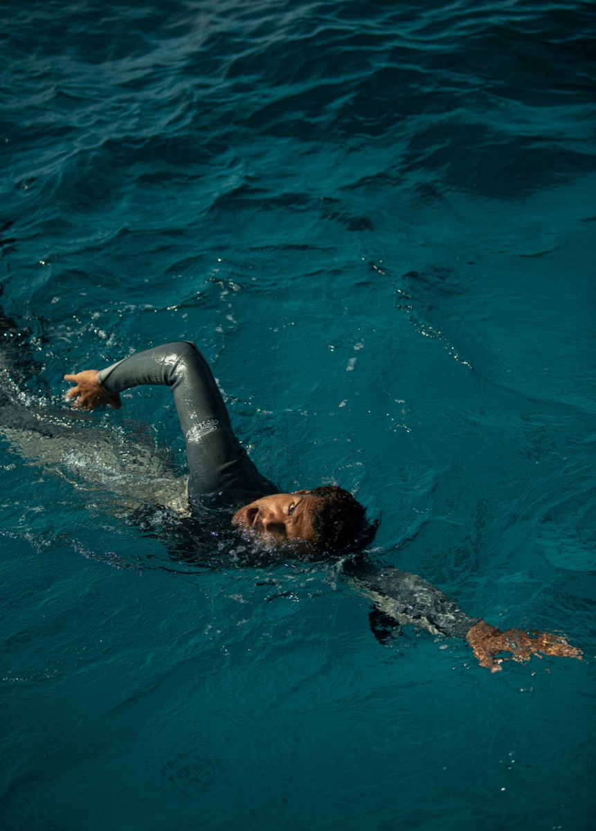 Open water swimmer practising a calm breathing rhythm