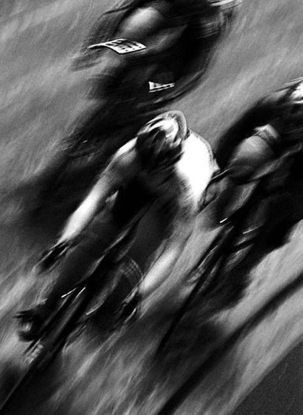 Cyclists riding together, motion blurred