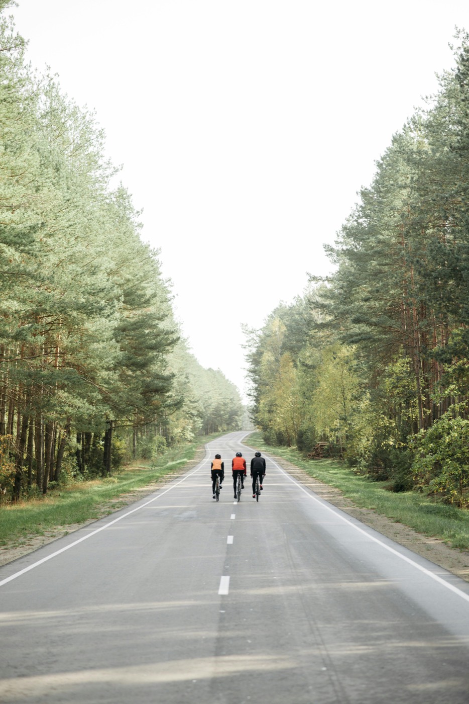 Three riders on an open road together